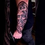 7 Mind-Blowing Black and Grey Realism Forearm Tattoos: The Ultimate Jesus Piece Ink You Can’t Miss!